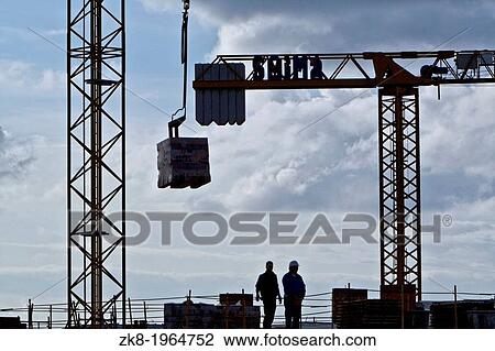 Construction workers handling crane, Andalusia, Spain. View Large Photo Image Stock Image - Construction workers handling crane, Andalusia, Spain.. Fotosearch
