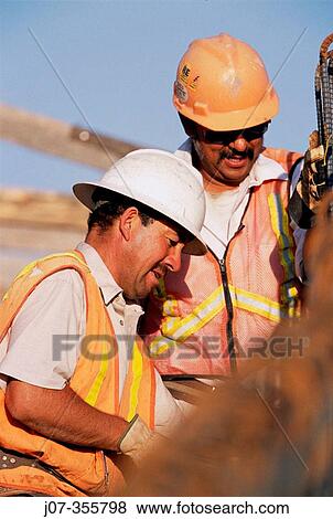 Construction workers. Texas. USA. View Large Photo Image Stock Photo - Construction workers. Texas. USA.. Fotosearch