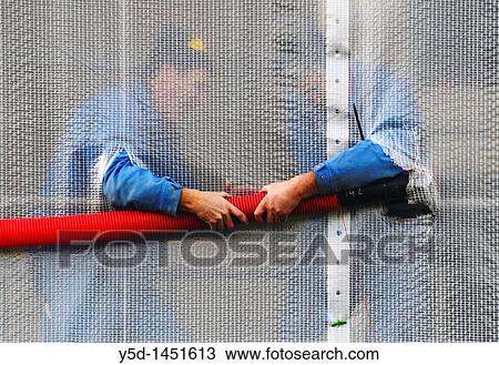 construction works, Geneva, Switzerland, new building for one of many organisations, cooperation of people at work View Large Photo Image Stock Image - construction works, Geneva, Switzerland, new building for one of many organisations, cooperation of people at work. Fotosearch