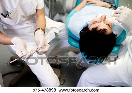 Consulta de Dentista View Large Photo Image Stock Photo - Consulta de Dentista. Fotosearch