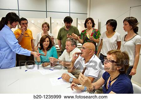 Stock Photo - Consumers tasting chocolate bars tutored by a sensory analysis specialist, AZTI-Tecnalia Marine and Food Research Center, Derio, Bizkaia, Euskadi, Spain. Fotosearch