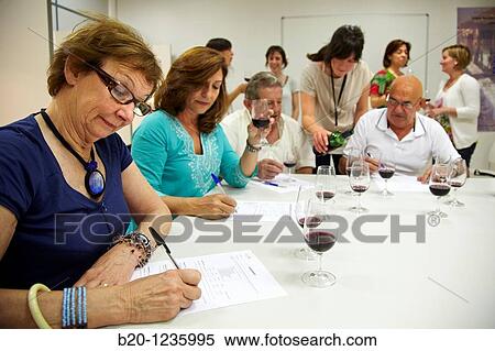 Stock Photography - Consumers tasting wine tutored by a sensory analysis specialist, AZTI-Tecnalia Marine and Food Research Center, Derio, Bizkaia, Euskadi, Spain. Fotosearch