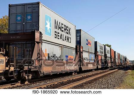 Container cargo on a freight train View Large Photo Image Stock Image - Container cargo on a freight train. Fotosearch
