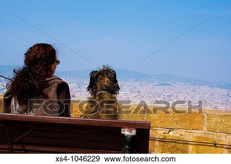Contemplating Barcelona city from Montjuic castel. Europe, Spain, Catalonia. Marzo 2010. View Large Photo Image Stock Photo - Contemplating Barcelona city from Montjuic castel. Europe, Spain, Catalonia. Marzo 2010.. Fotosearch