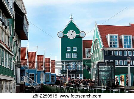 Stock Photography - Contemporary architecture, which shamelessly cites the traditional local building style of the wooden Zaandam houses near Amsterdam.. Fotosearch