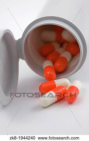 Contents of a plastic boat with pills isolated on white background. View Large Photo Image Stock Image - Contents of a plastic boat with pills isolated on white background.. Fotosearch