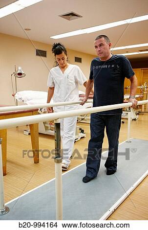 Control of walking, parallel bars, reeducation exercise, rebahilitation. Policlinica Gipuzkoa, San Sebastian, Donostia, Euskadi, Spain View Large Photo Image Picture - Control of walking, parallel bars, reeducation exercise, rebahilitation. Policlinica Gipuzkoa, San Sebastian, Donostia, Euskadi, Spain. Fotosearch