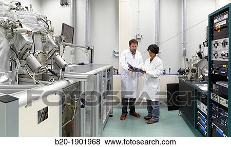 Stock Photo - Controlling deposition of various organic and inorganic materials by evaporation. Fotosearch