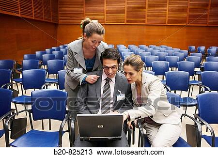 Stock Image - Conventioneers in lecture hall, convention center, Kursaal Center. San Sebastian, Guipuzcoa, Basque Country, Spain. Fotosearch