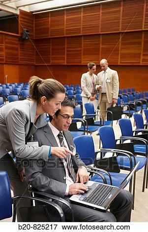 Stock Photo - Conventioneers in lecture hall, convention center, Kursaal Center. San Sebastian, Guipuzcoa, Basque Country, Spain. Fotosearch