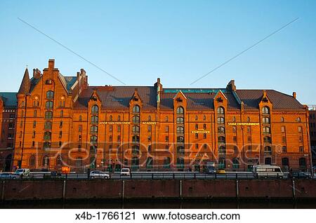 Stock Image - Converted warehouse along Binnenhafen canal Speicherstadt the ware house distict Hamburg Germany Europe. Fotosearch