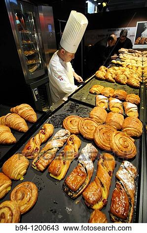 Stock Image - Cook and pastries. Fotosearch