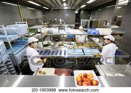 Stock Photo - Cook, Food menu preparation, hospital kitchen, Onkologikoa Hospital, Oncology Institute, Case Center for prevention, diagnosis and treatment of cancer, Donostia, San Sebastian, Gipuzkoa, Basque Country, Spain. Fotosearch