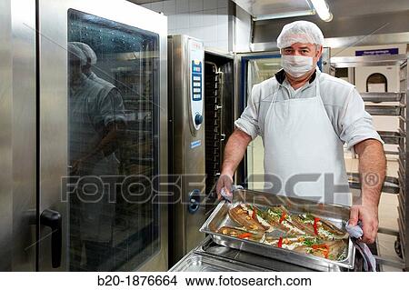 Cook preparing food, Hospital meal preparation, Kitchen, Hospital Donostia, San Sebastian, Gipuzkoa, Basque Country, Spain View Large Photo Image Picture - Cook preparing food, Hospital meal preparation, Kitchen, Hospital Donostia, San Sebastian, Gipuzkoa, Basque Country, Spain. Fotosearch