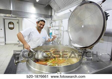 Cook preparing food, Hospital meal preparation, Kitchen, Hospital Donostia, San Sebastian, Gipuzkoa, Basque Country, Spain View Large Photo Image Stock Image - Cook preparing food, Hospital meal preparation, Kitchen, Hospital Donostia, San Sebastian, Gipuzkoa, Basque Country, Spain. Fotosearch