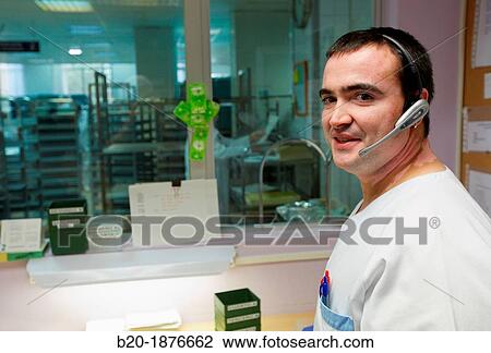 Cook with earphone, Hospital meal preparation, Kitchen, Hospital Donostia, San Sebastian, Gipuzkoa, Basque Country, Spain View Large Photo Image Stock Image - Cook with earphone, Hospital meal preparation, Kitchen, Hospital Donostia, San Sebastian, Gipuzkoa, Basque Country, Spain. Fotosearch