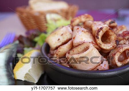 Cooked squid with pimento hot sauce View Large Photo Image Stock Photo - Cooked squid with pimento hot sauce. Fotosearch