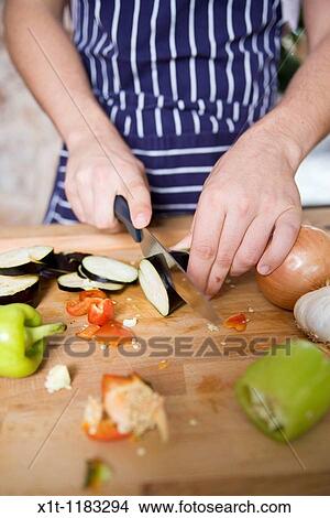 Cooking young man. View Large Photo Image Picture - Cooking young man.. Fotosearch