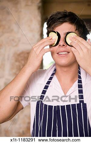 Cooking young man. View Large Photo Image Stock Image - Cooking young man.. Fotosearch