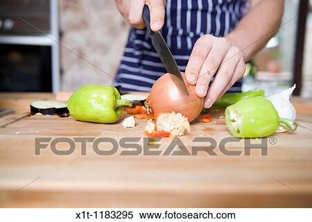 Cooking young man. View Large Photo Image Stock Photography - Cooking young man.. Fotosearch