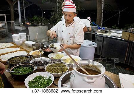 Cooks at Lageur Resort Sanya Beach, Hainan Island. View Large Photo Image Stock Image - Cooks at Lageur Resort Sanya Beach, Hainan Island.. Fotosearch