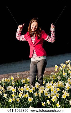 Stock Image - cool girl portrait teenager spring daffs. Fotosearch