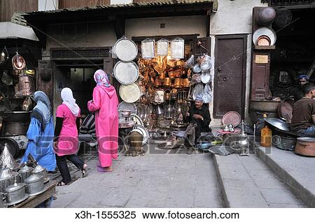 Stock Photography - coppersmiths on as-Seffarine square, medina, Fes, Morocco, North Africa. Fotosearch