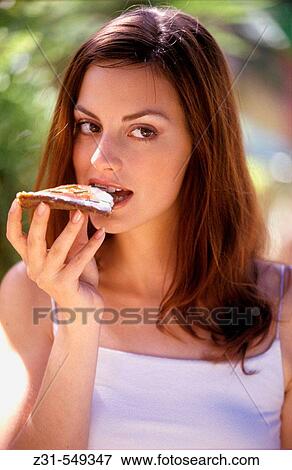 Cora, Bread slice, Biting View Large Photo Image Stock Photo - Cora, Bread slice, Biting. Fotosearch