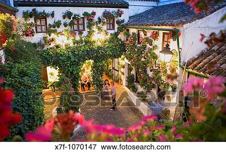 Stock Photo - Cordoba Andalusia Spain: Typical courtyard, in San Basilio 50 Street Headquarters of the friends? association of the courtyards of Cordoba. Fotosearch