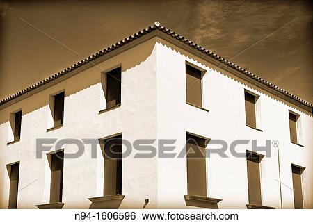 Corner of a building in El Puerto de la Selva, Gerona, Catalonia, Spain. View Large Photo Image Stock Photograph - Corner of a building in El Puerto de la Selva, Gerona, Catalonia, Spain.. Fotosearch