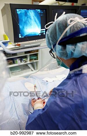 Coronary catheterization, Hemodynamics. Hospital Policlinica Gipuzkoa, San Sebastian, Donostia, Euskadi, Spain View Large Photo Image Stock Photo - Coronary catheterization, Hemodynamics. Hospital Policlinica Gipuzkoa, San Sebastian, Donostia, Euskadi, Spain. Fotosearch