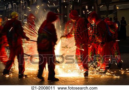 Correfoc, diables. Fire and sparks of demons. Catalan folklore. Vilanova i la Geltr, Catalonia, Spain. View Large Photo Image Stock Image - Correfoc, diables. Fire and sparks of demons. Catalan folklore. Vilanova i la Geltr, Catalonia, Spain.. Fotosearch