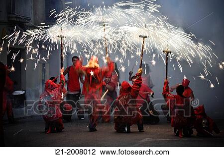 Correfoc, diables. Fire and sparks of demons. Catalan folklore. Vilanova i la Geltr, Catalonia, Spain. View Large Photo Image Stock Image - Correfoc, diables. Fire and sparks of demons. Catalan folklore. Vilanova i la Geltr, Catalonia, Spain.. Fotosearch