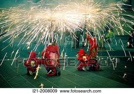 Stock Photo - Correfoc, diables. Fire and sparks of demons. Catalan folklore. Vilanova i la Geltr, Catalonia, Spain.. Fotosearch