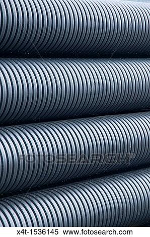 Corrugated drainage pipes ready for a construction project in Norway View Large Photo Image Stock Photography - Corrugated drainage pipes ready for a construction project in Norway. Fotosearch