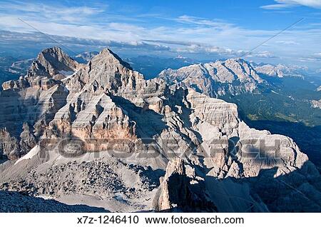 Cortina, view of Tofana Di Mezzo and the Rifugio Giussani from the summit of Tofana Di Rozes after climbing the Giovanni Lipella via ferrata on Tofana De Rozes in the Dolomite Mountains near the city of Cortina in northern Italy View Large Photo Image Stock Image - Cortina, view of Tofana Di Mezzo and the Rifugio Giussani from the summit of Tofana Di Rozes after climbing the Giovanni Lipella via ferrata on Tofana De Rozes in the Dolomite Mountains near the city of Cortina in northern Italy. Fotosearch