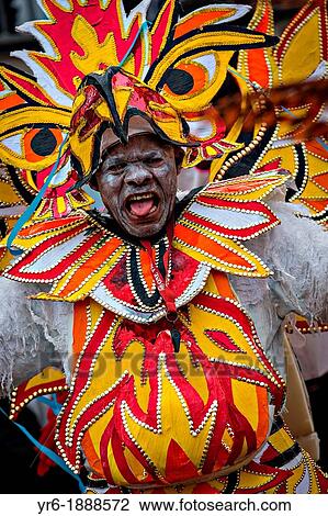Costumed dancers celebrate the New Year with the Junkanoo Parade on January 1, 2013 in Nassau, Bahamas The carnival like festival is celebrated in the early hours of the New Year lasting until the late morning and dates back to slavery days View Large Photo Image Stock Image - Costumed dancers celebrate the New Year with the Junkanoo Parade on January 1, 2013 in Nassau, Bahamas The carnival like festival is celebrated in the early hours of the New Year lasting until the late morning and dates back to slavery days. Fotosearch