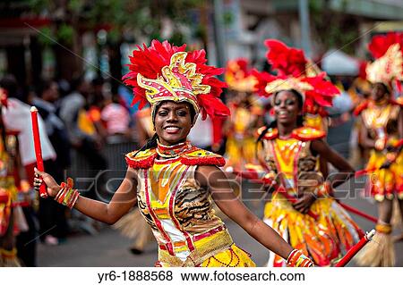 Stock Photo - Costumed dancers celebrate the New Year with the Junkanoo Parade on January 1, 2013 in Nassau, Bahamas The carnival like festival is celebrated in the early hours of the New Year lasting until the late morning and dates back to slavery days. Fotosearch