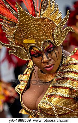 Stock Photo - Costumed dancers celebrate the New Year with the Junkanoo Parade on January 1, 2013 in Nassau, Bahamas The carnival like festival is celebrated in the early hours of the New Year lasting until the late morning and dates back to slavery days. Fotosearch