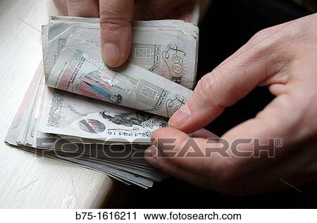 counting pounds, pounds in the hands View Large Photo Image Stock Image - counting pounds, pounds in the hands. Fotosearch