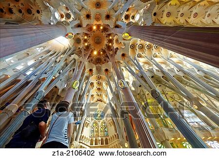 Couple admiring the ceiling of the Sagrada Familia Temple by Antoni Gaudi. Barcelona, Spain. View Large Photo Image Stock Image - Couple admiring the ceiling of the Sagrada Familia Temple by Antoni Gaudi. Barcelona, Spain.. Fotosearch