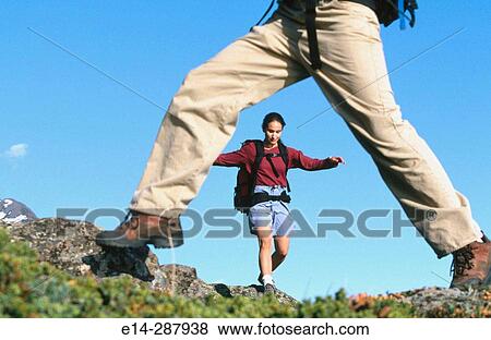 Stock Photo - Couple along Turnagain Arm in summer. Chugach State Park. Alaska. Fotosearch