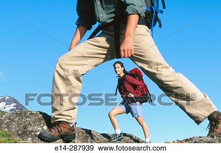 Stock Photo - Couple along Turnagain Arm in summer. Chugach State Park. Alaska. Fotosearch