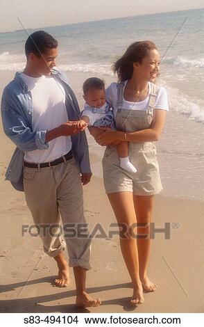 Couple and baby View Large Photo Image Picture - Couple and baby. Fotosearch