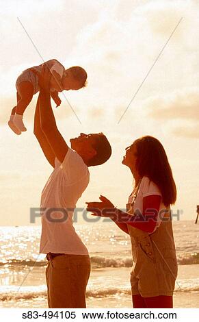 Couple and baby View Large Photo Image Stock Photography - Couple and baby. Fotosearch