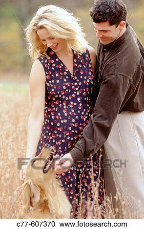 Couple and dog View Large Photo Image Stock Image - Couple and dog. Fotosearch