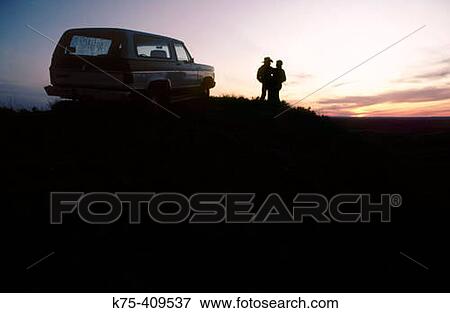 Couple and van on their ranch, Montana, USA View Large Photo Image Stock Photo - Couple and van on their ranch, Montana, USA. Fotosearch
