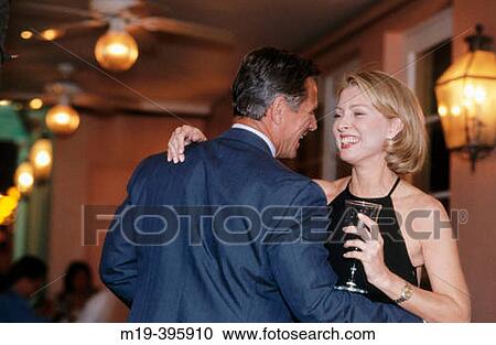 couple at a party View Large Photo Image Stock Image - couple at a party. Fotosearch