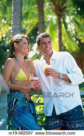couple at a tropical resort View Large Photo Image Stock Photo - couple at a tropical resort. Fotosearch