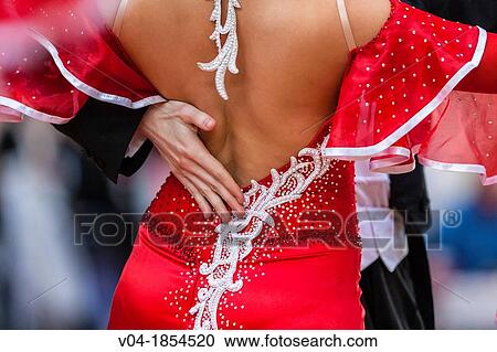 Stock Image - Couple at ballroom dancing at a dancing competition, Germany, Europe. Fotosearch